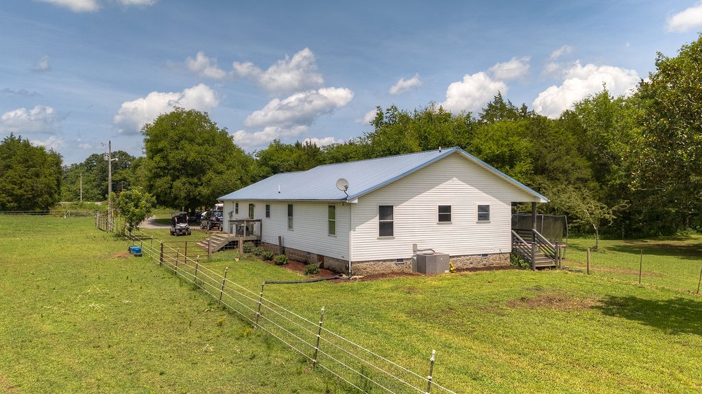 4580 Simmons Bluff Road Lebanon, TN 37090 - Photo 8 of 49 a view of a house with a yard