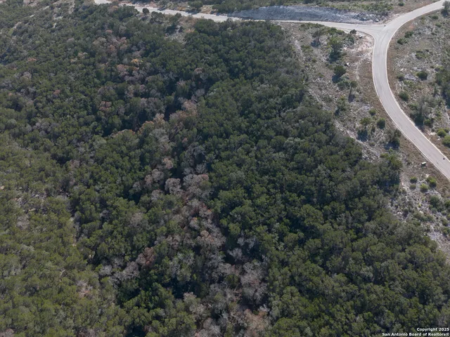 a backyard of a house with a yard