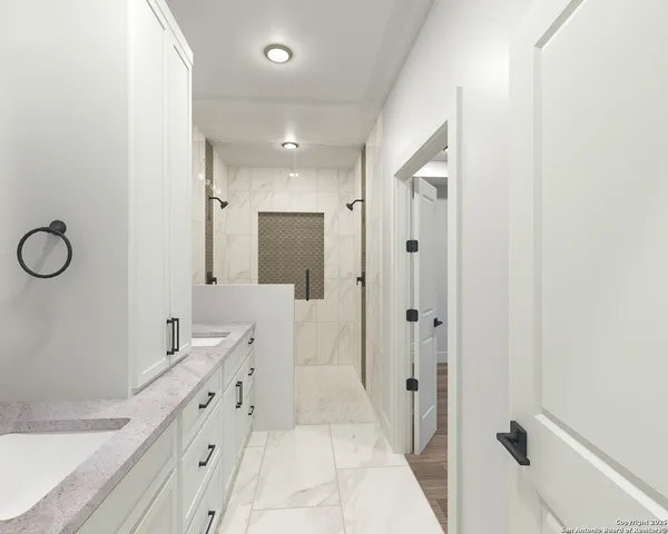 a bathroom with a double vanity sink mirror and shower