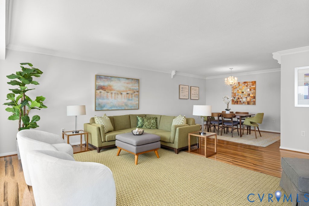 2956 Hathaway Road, Unit U704 Richmond, VA 23225 - Photo 11 of 42 Open-concept living space featuring wood-finish fl
