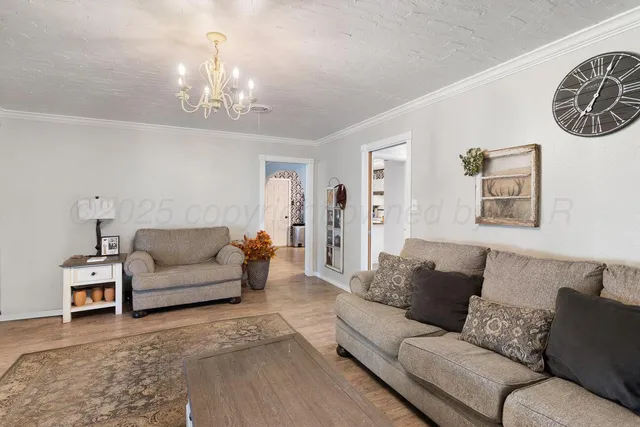 a kitchen that has a sink and a stove in it