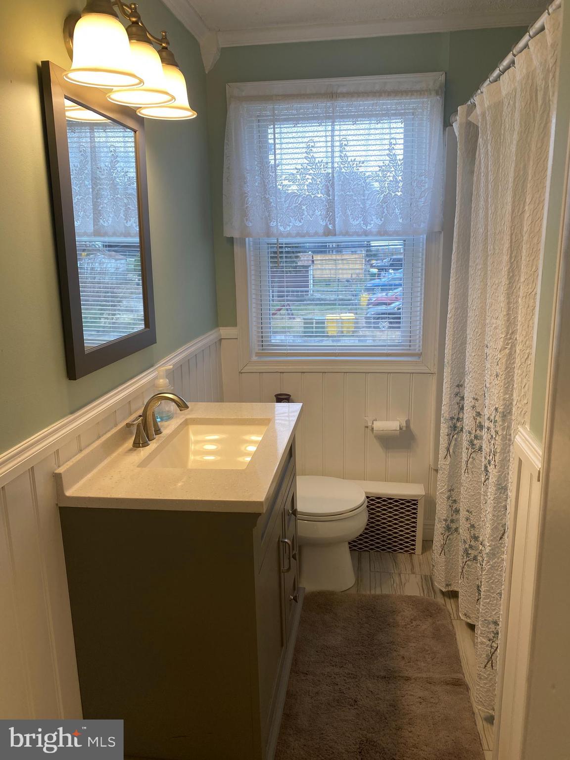 409 Old Riverside Road Brooklyn, MD 21225 - Photo 12 of 34 New Bathroom w/Furniture Style vanity, ceramic.
