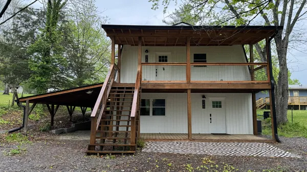 a view of a house with a balcony