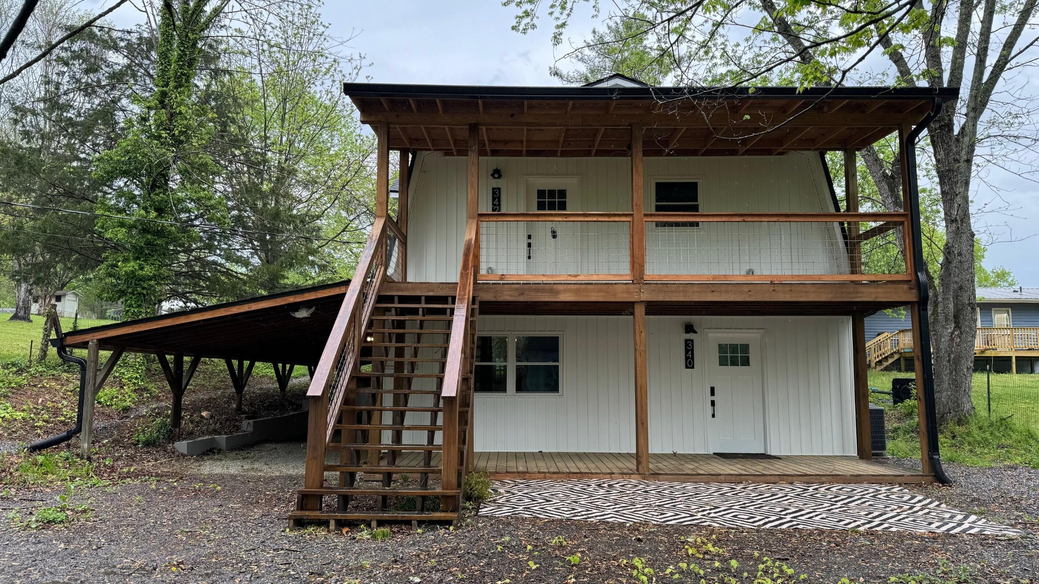 340 Grady Road Etowah, TN 37331 - Photo 1 of 34 a view of a house with a balcony