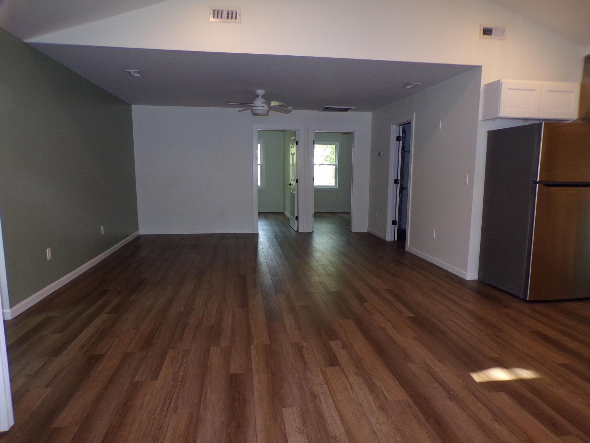 340 Grady Road Etowah, TN 37331 - Photo 25 of 34 a view of wooden floor and windows in an empty room