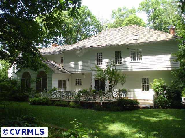 12005 Reeds Bluff Lane Midlothian, VA 23113 - Photo 2 of 10 a front view of a house with a garden