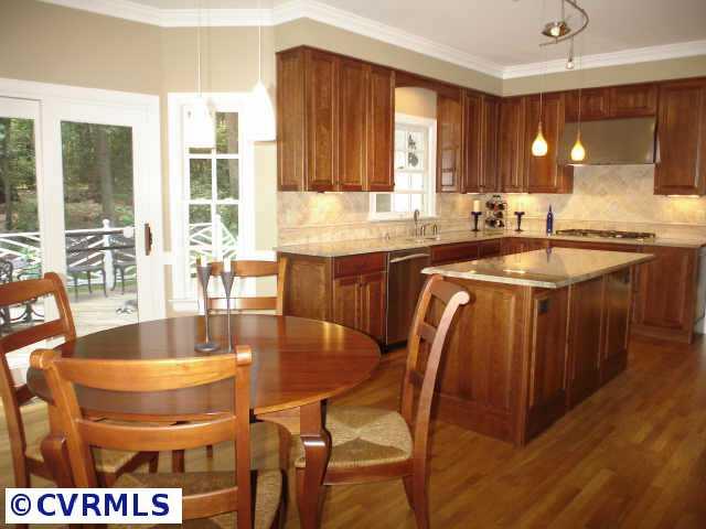 12005 Reeds Bluff Lane Midlothian, VA 23113 - Photo 7 of 10 a dining table with chairs and window