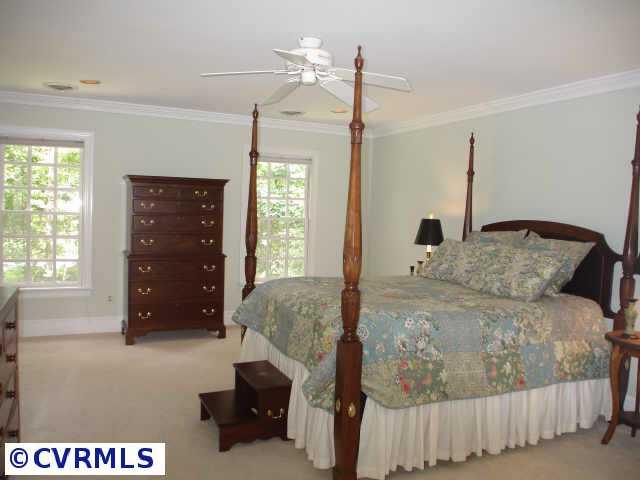 12005 Reeds Bluff Lane Midlothian, VA 23113 - Photo 10 of 10 a bedroom with a bed and a window