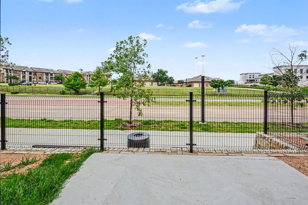 1111 Raiford Road, Unit 121 Carrollton, TX 75007 - Photo 26 of 30 a view of a road with a road and next to a road