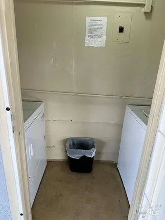 a view of a backyard with sitting area