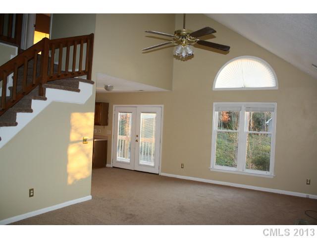 6002 Lanai Lane Tega Cay, SC 29708 - Photo 3 of 16 a view of an entryway with wooden floor