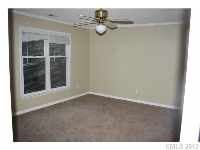 6002 Lanai Lane Tega Cay, SC 29708 - Photo 8 of 16 a view of an empty room with windows