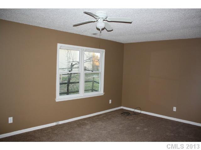 6002 Lanai Lane Tega Cay, SC 29708 - Photo 10 of 16 a view of an empty room with a window