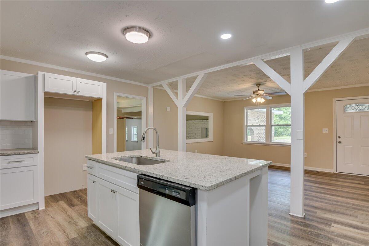 1150 Chico Road Crawfordville, GA 30631 - Photo 14 of 57 Kitchen Island with sink and dishwasher