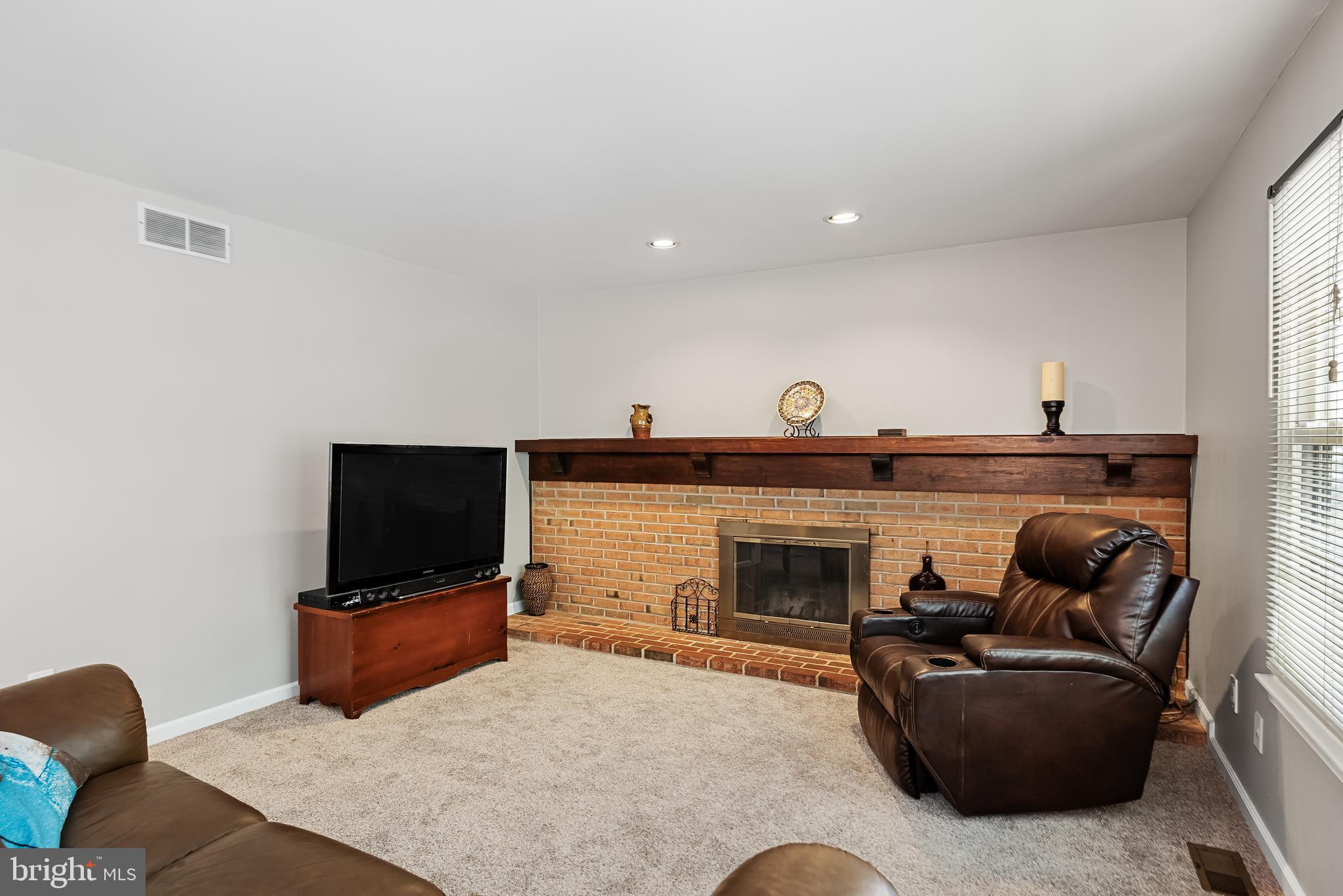 26 Brookview Drive Voorhees, NJ 08043 - Photo 12 of 50 a living room with furniture and a flat screen tv