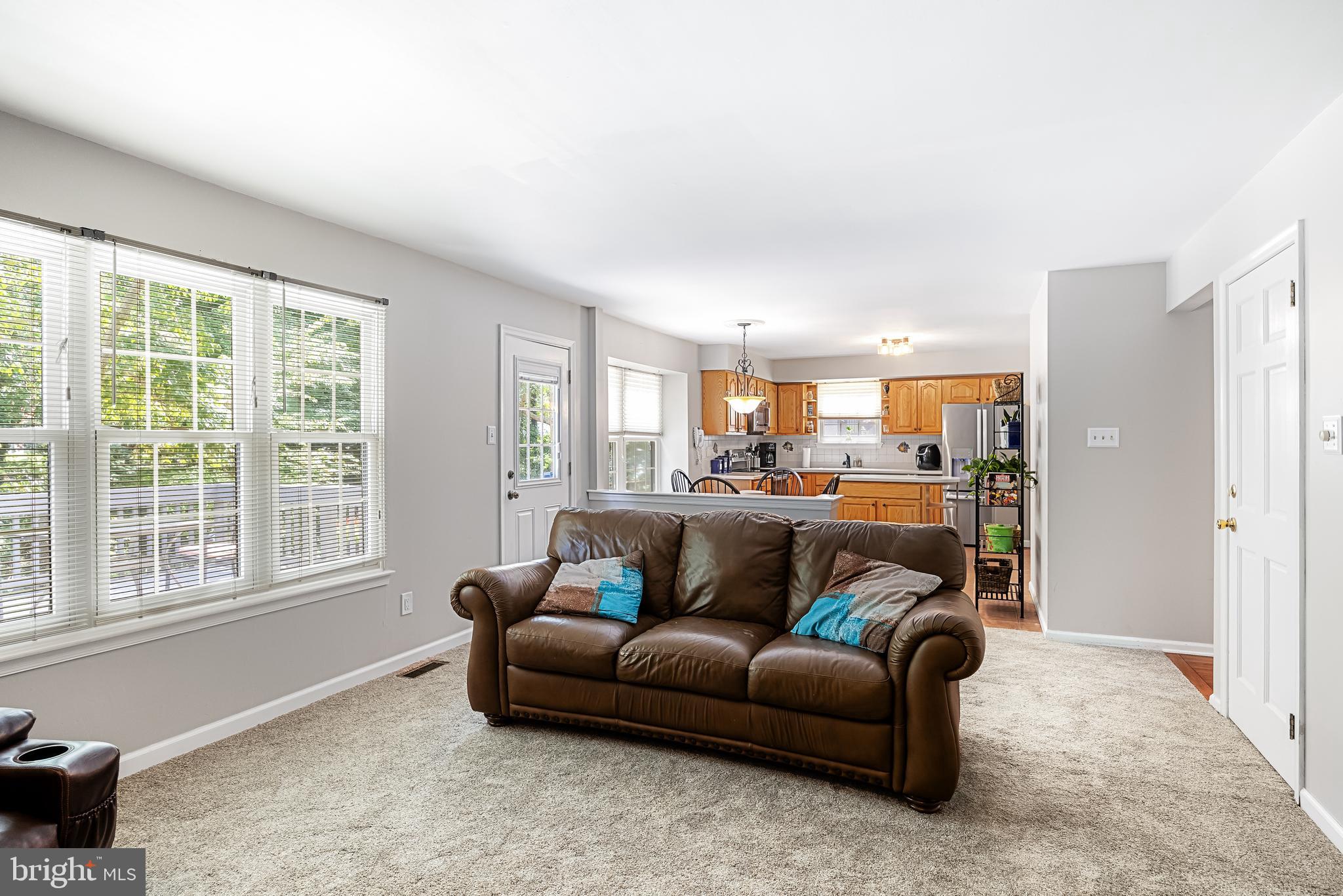 26 Brookview Drive Voorhees, NJ 08043 - Photo 13 of 50 a living room with furniture and a large window
