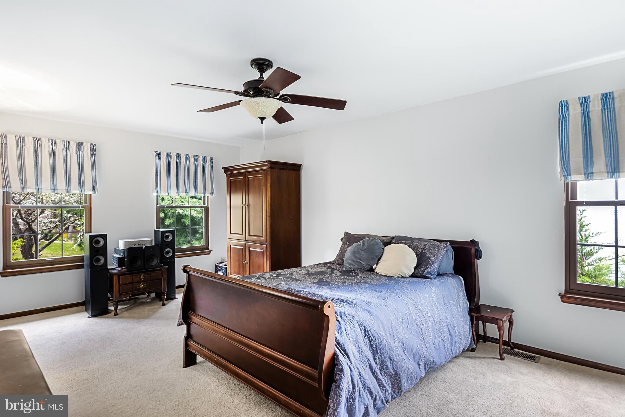 26 Brookview Drive Voorhees, NJ 08043 - Photo 20 of 50 a bedroom with a bed and a couch