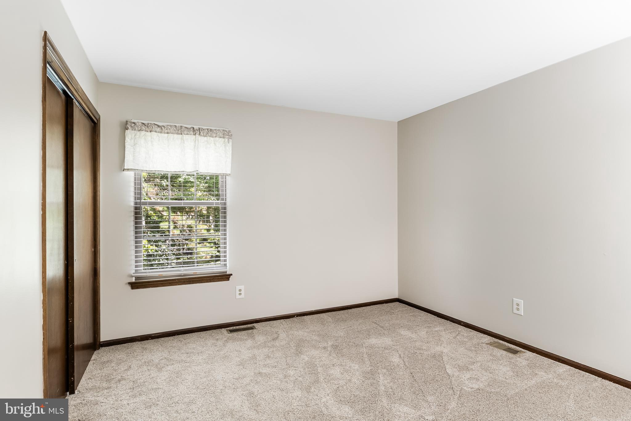 26 Brookview Drive Voorhees, NJ 08043 - Photo 28 of 50 a view of an empty room with a window