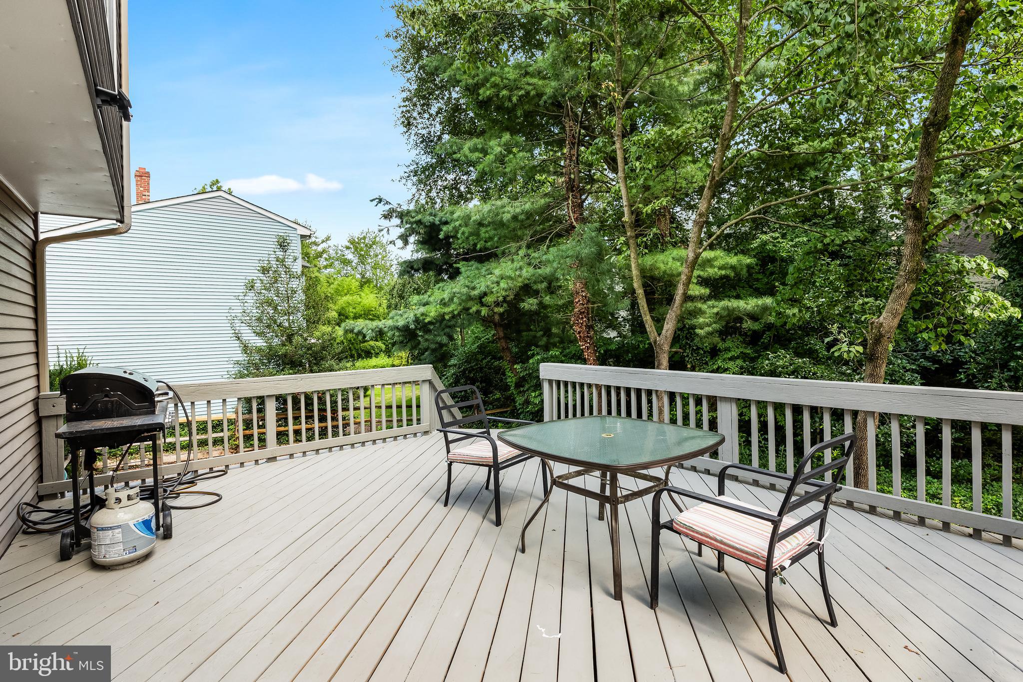 26 Brookview Drive Voorhees, NJ 08043 - Photo 32 of 50 a view of a chairs and table on the deck