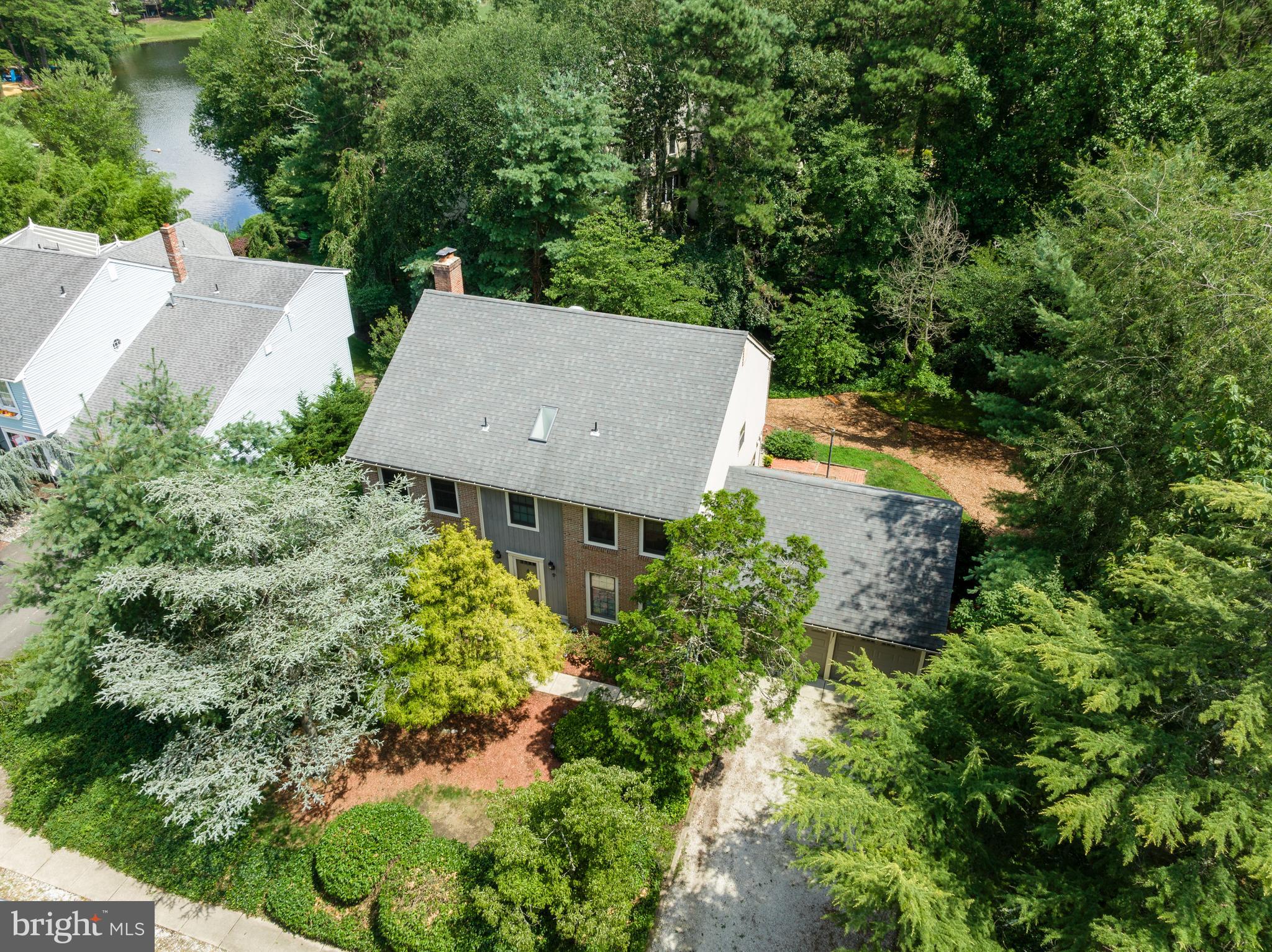 26 Brookview Drive Voorhees, NJ 08043 - Photo 35 of 50 an aerial view of a house with garden space and sitting space