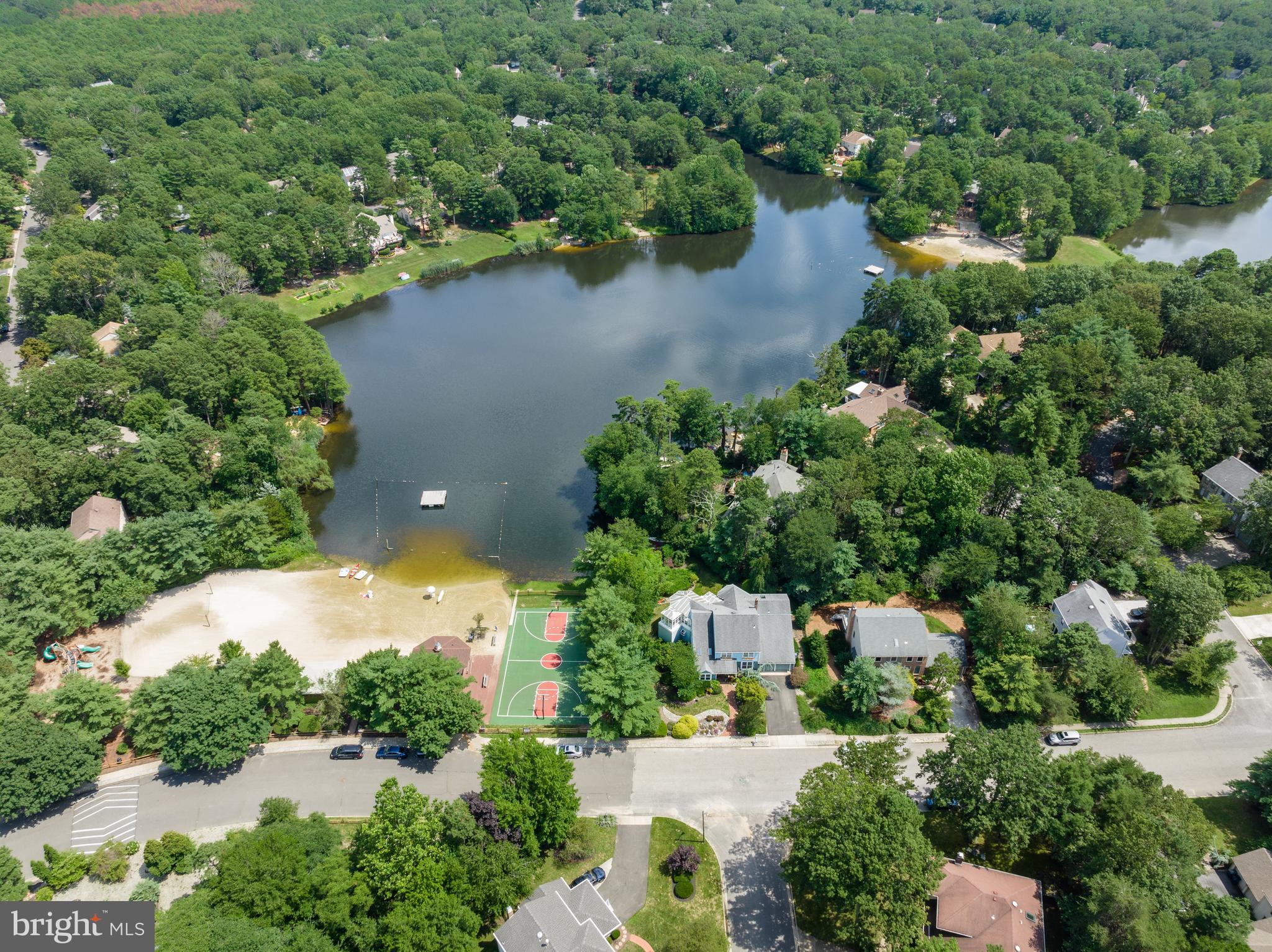 26 Brookview Drive Voorhees, NJ 08043 - Photo 39 of 50 an aerial view of a house with yard and lake view