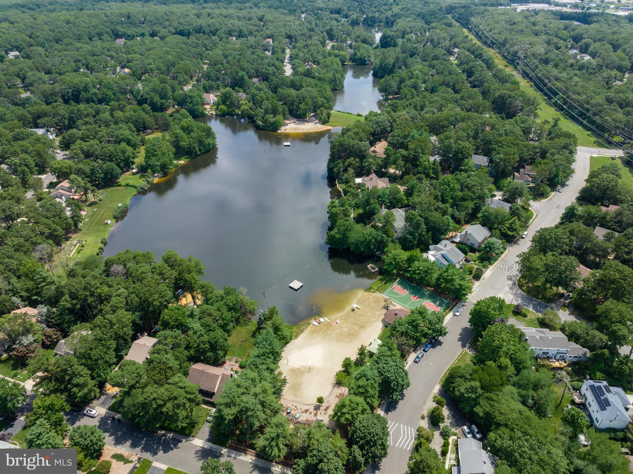 26 Brookview Drive Voorhees, NJ 08043 - Photo 43 of 50 an aerial view of a house with yard and outdoor seating