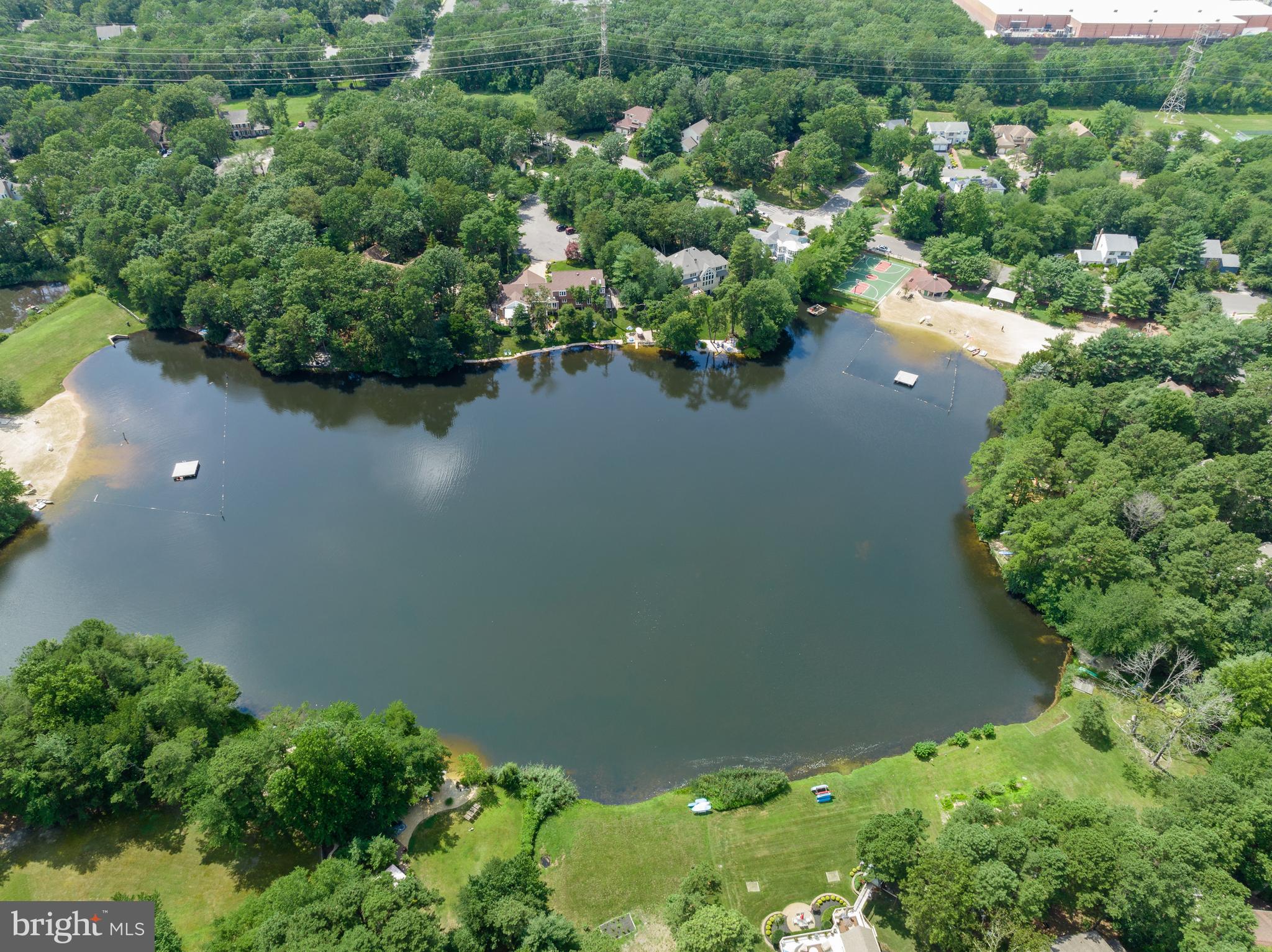 26 Brookview Drive Voorhees, NJ 08043 - Photo 48 of 50 an aerial view of a house with a yard and lake view