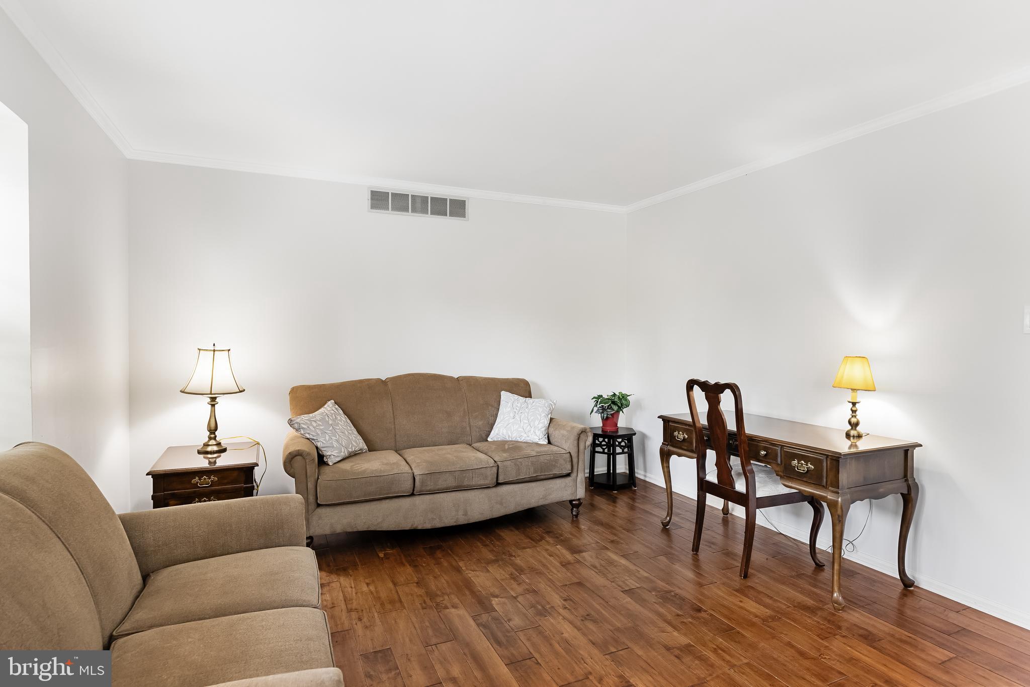 26 Brookview Drive Voorhees, NJ 08043 - Photo 8 of 50 a living room with furniture and wooden floor