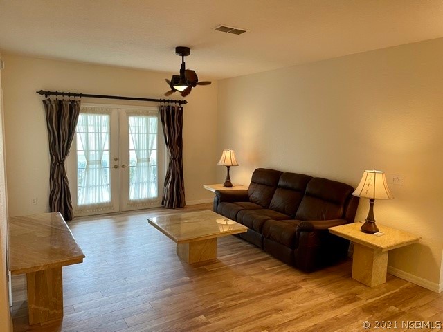 830 Airport Road, Unit 202 Port Orange, FL 32128 - Photo 18 of 35 a living room with furniture and a window