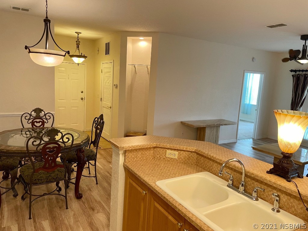 830 Airport Road, Unit 202 Port Orange, FL 32128 - Photo 19 of 35 a bathroom with a sink and a mirror