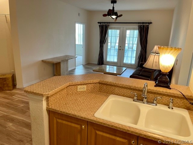 830 Airport Road, Unit 202 Port Orange, FL 32128 - Photo 20 of 35 a kitchen with a sink and a window