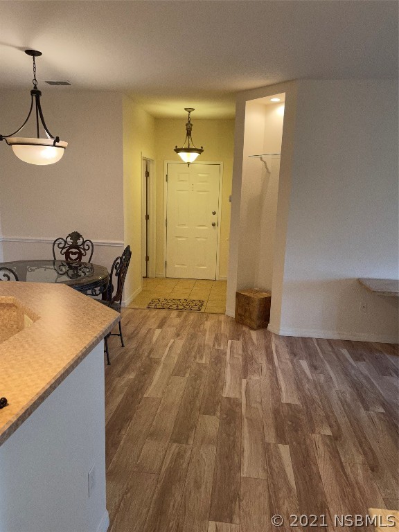 830 Airport Road, Unit 202 Port Orange, FL 32128 - Photo 22 of 35 a view of a room with wooden floor