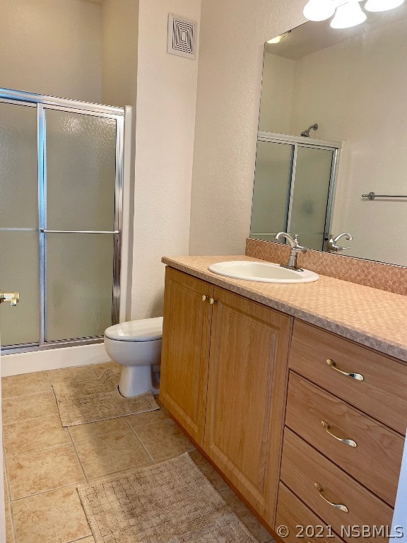 830 Airport Road, Unit 202 Port Orange, FL 32128 - Photo 25 of 35 a spacious bathroom with a granite countertop sink and a mirror