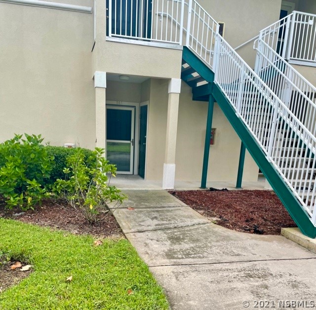 830 Airport Road, Unit 202 Port Orange, FL 32128 - Photo 10 of 35 a view of outdoor space and deck