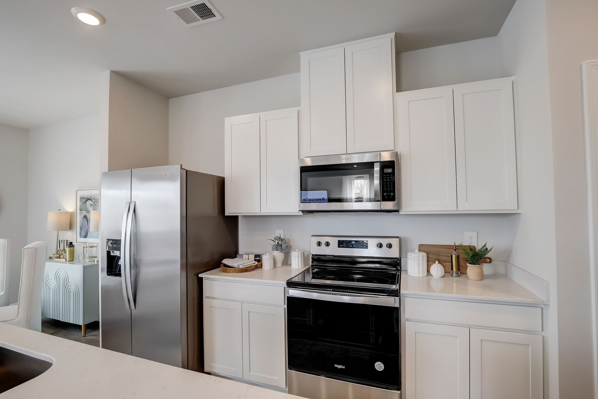2121 Widgeon Point Lebanon, TN 37090 - Photo 18 of 42 a kitchen with stainless steel appliances a refrigerator a stove a microwave and cabinets
