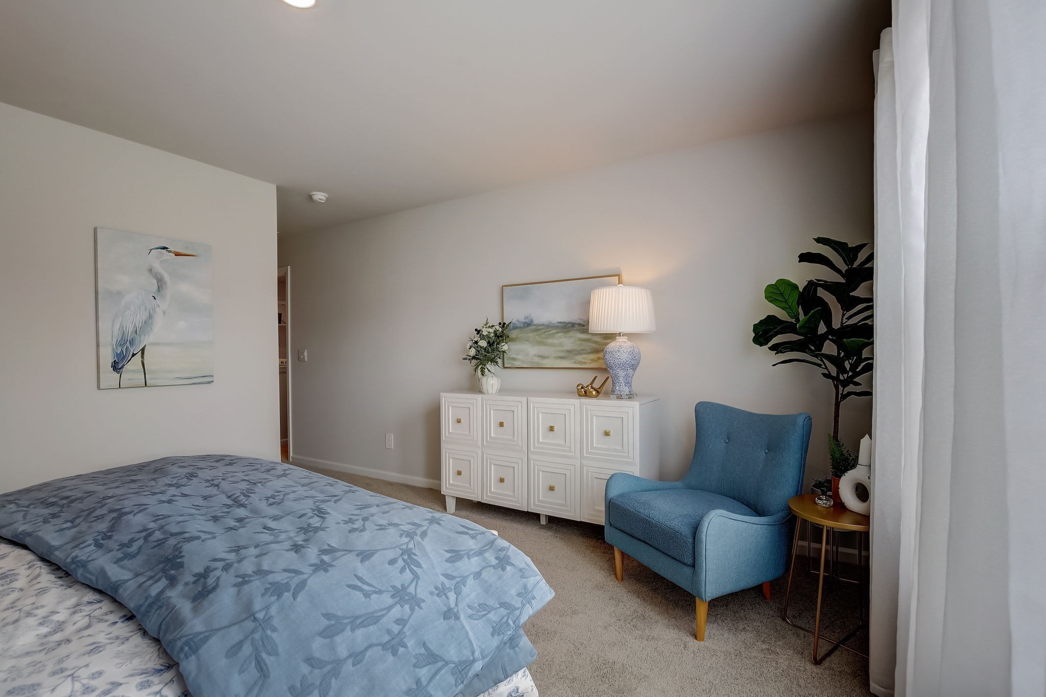 2121 Widgeon Point Lebanon, TN 37090 - Photo 22 of 42 a bedroom with a bed and a potted plant