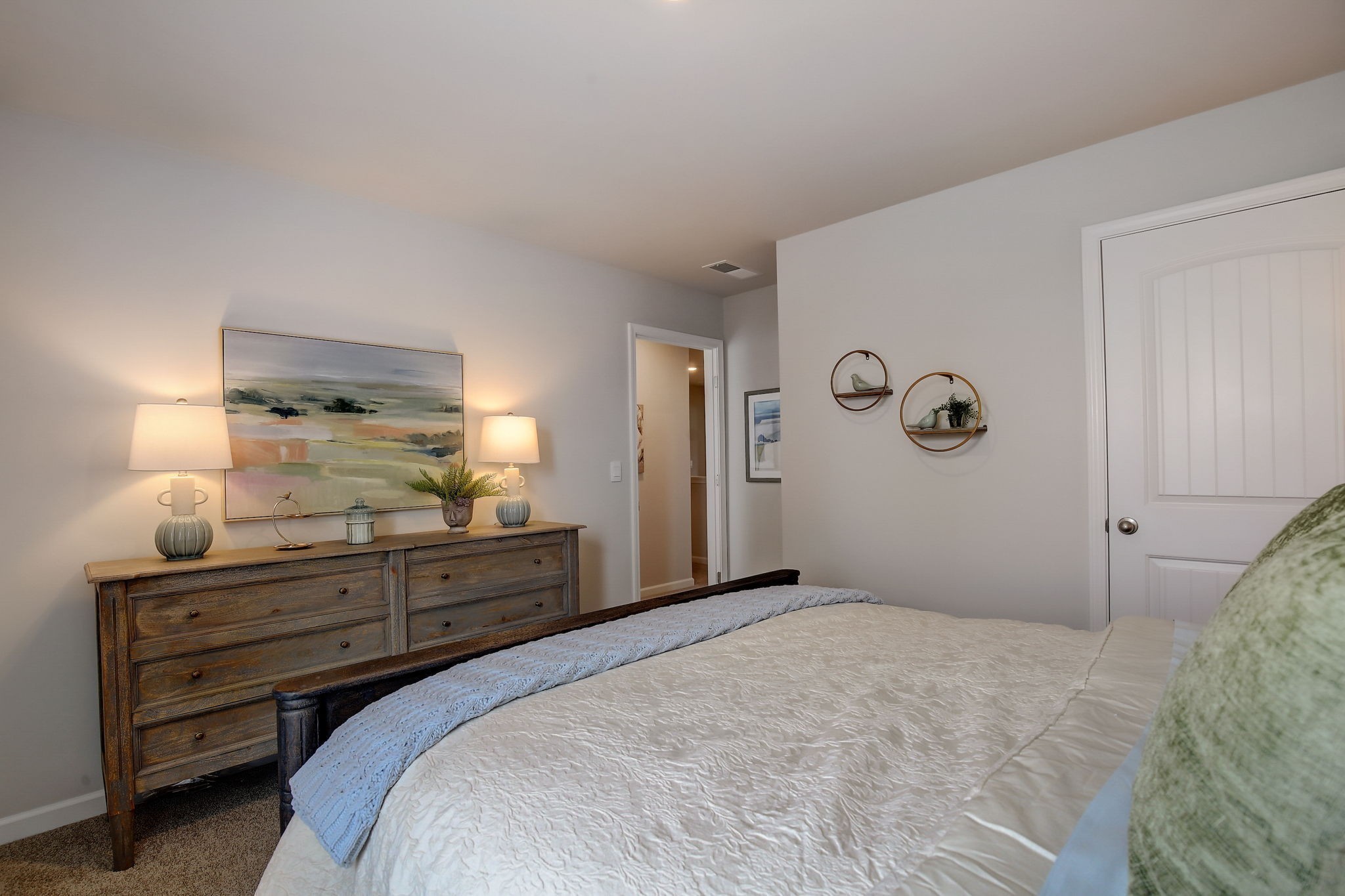 2121 Widgeon Point Lebanon, TN 37090 - Photo 28 of 42 a bedroom with a bed and a lamp on dresser