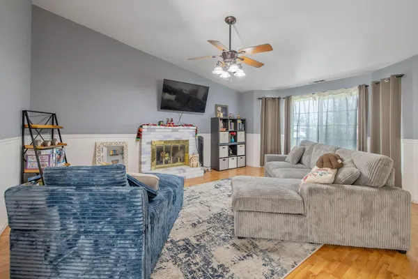 a kitchen with stainless steel appliances granite countertop a sink and cabinets