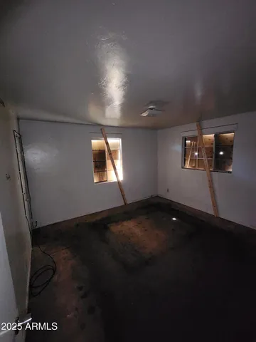 a view of an empty room and window