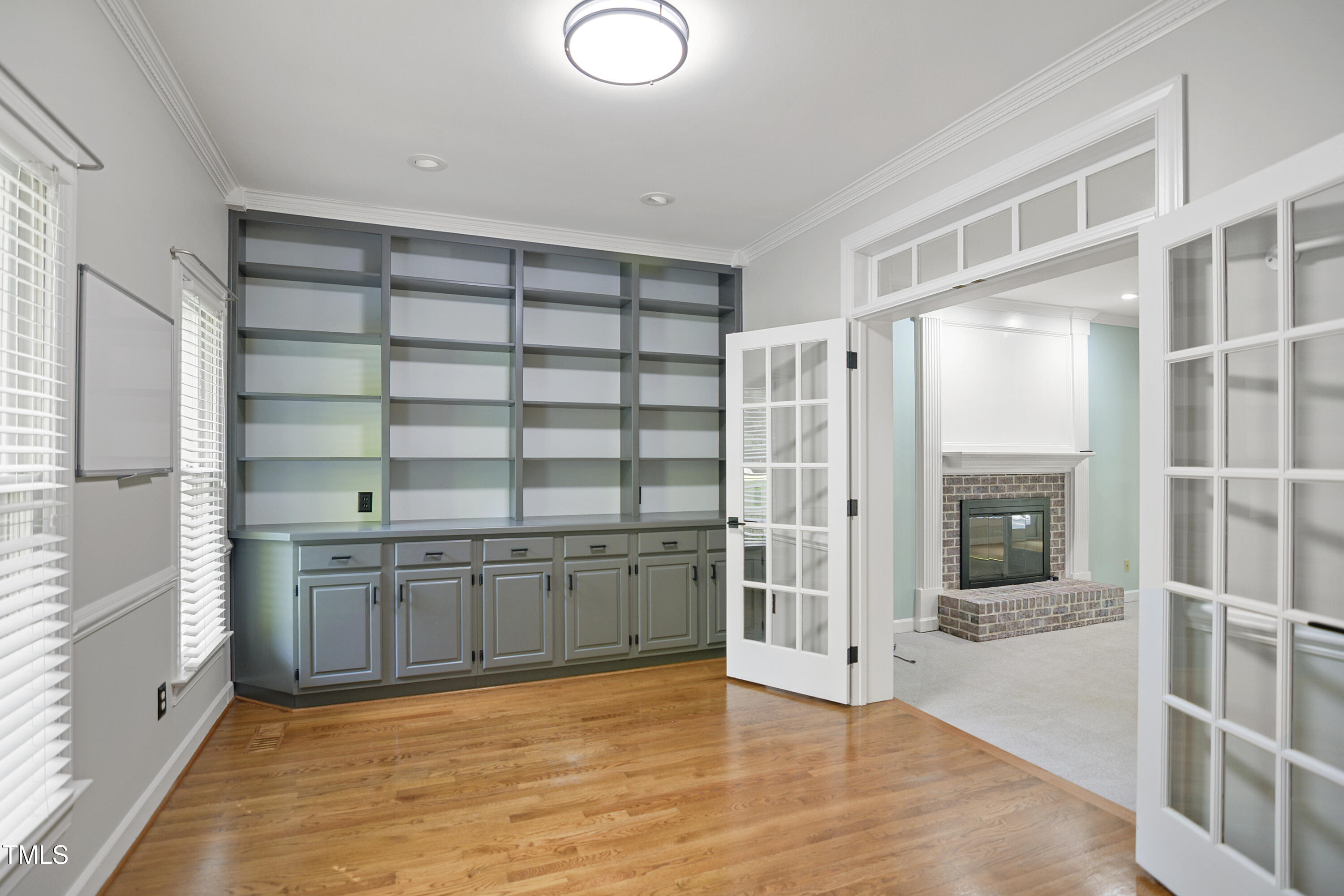 1405 Shadowview Court Raleigh, NC 27614 - Photo 4 of 37 a view of an empty room with cabinet and a window
