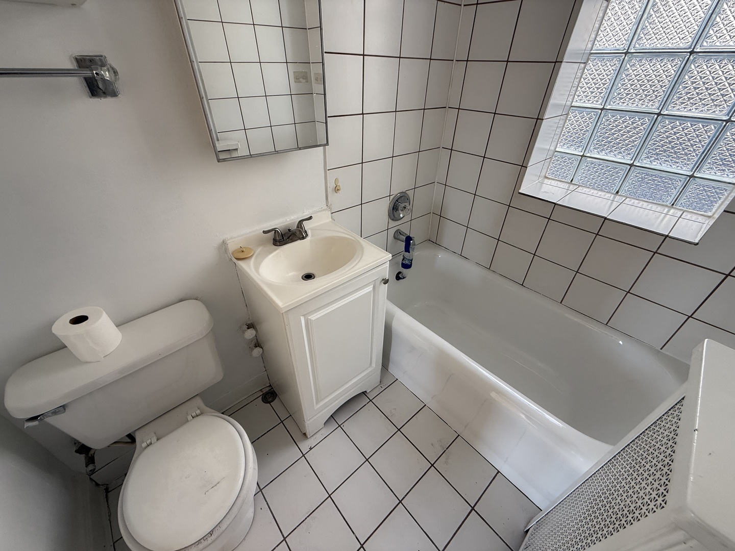 2148 Gunderson Avenue, Unit 341 Berwyn, IL 60402 - Photo 11 of 11 a white toilet sitting next to a bathroom sink