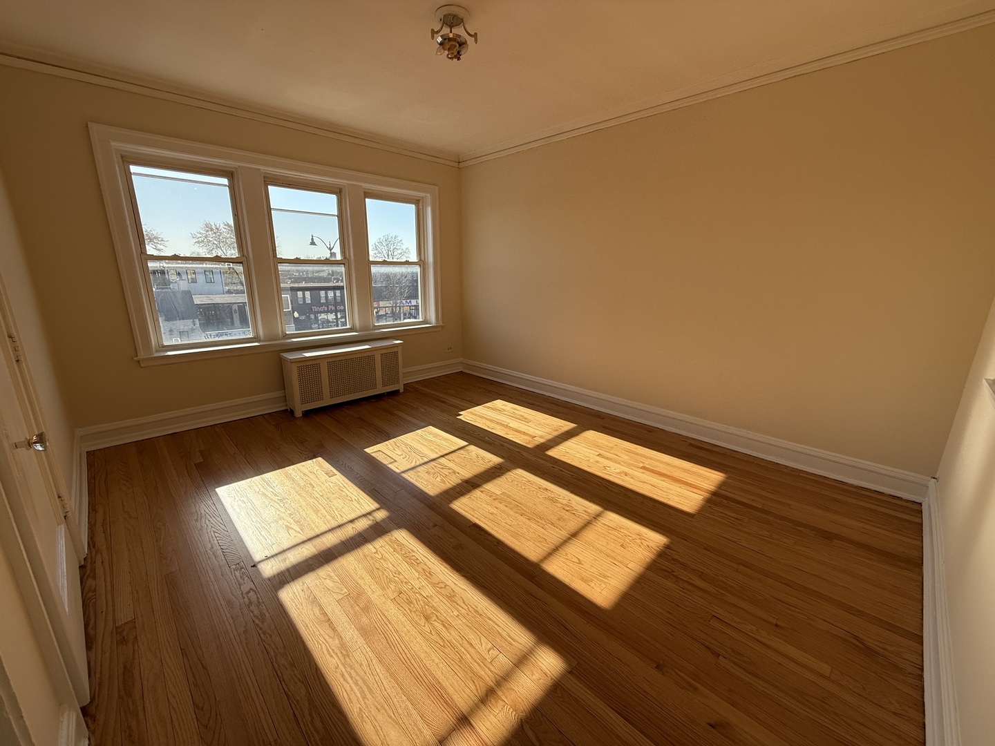 2148 Gunderson Avenue, Unit 341 Berwyn, IL 60402 - Photo 2 of 11 a view of an empty room with a window