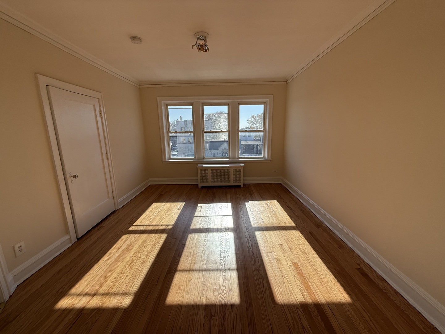2148 Gunderson Avenue, Unit 341 Berwyn, IL 60402 - Photo 4 of 11 a view of empty room with wooden floor