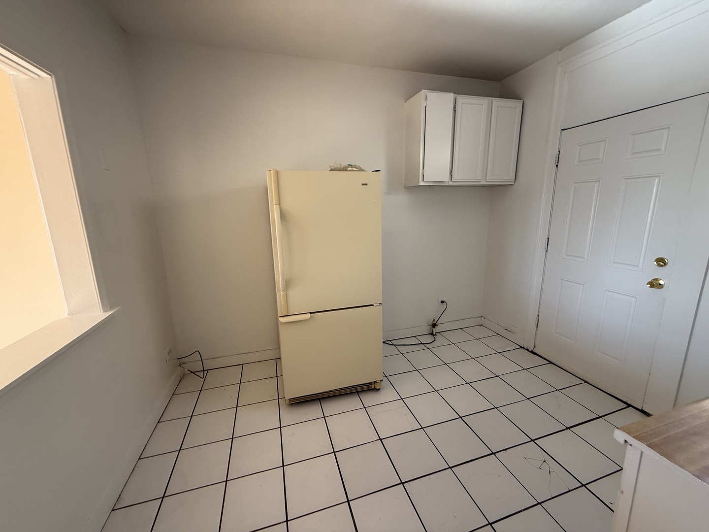 2148 Gunderson Avenue, Unit 341 Berwyn, IL 60402 - Photo 10 of 11 a white refrigerator freezer and a stove sitting inside of a kitchen