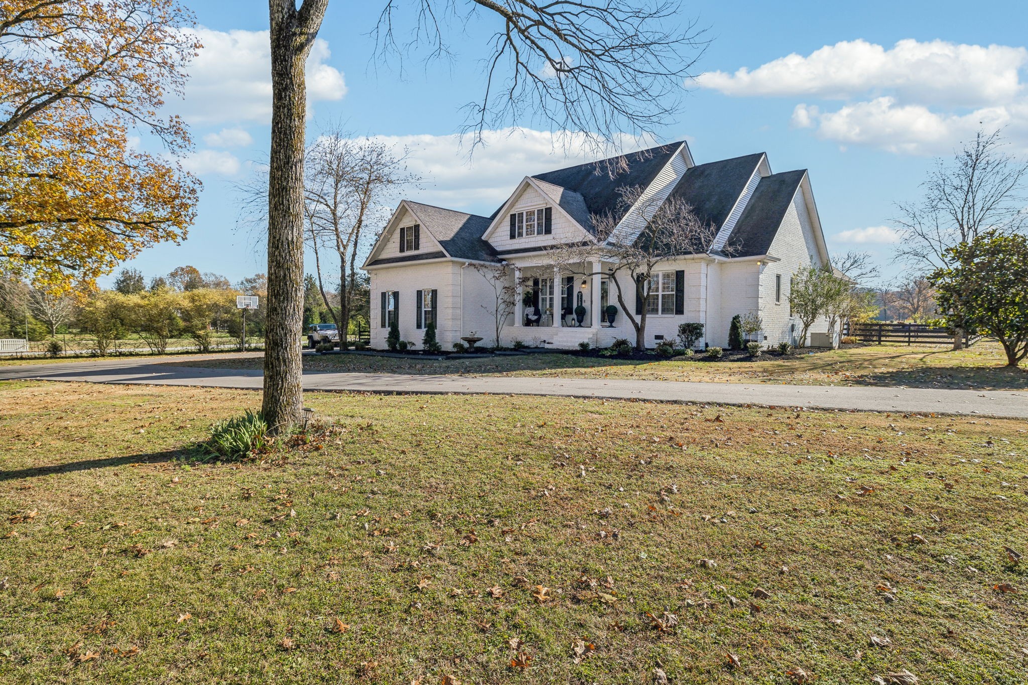576 Rocky Valley Road Lebanon, TN 37090 - Photo 1 of 62 a front view of a house with a yard