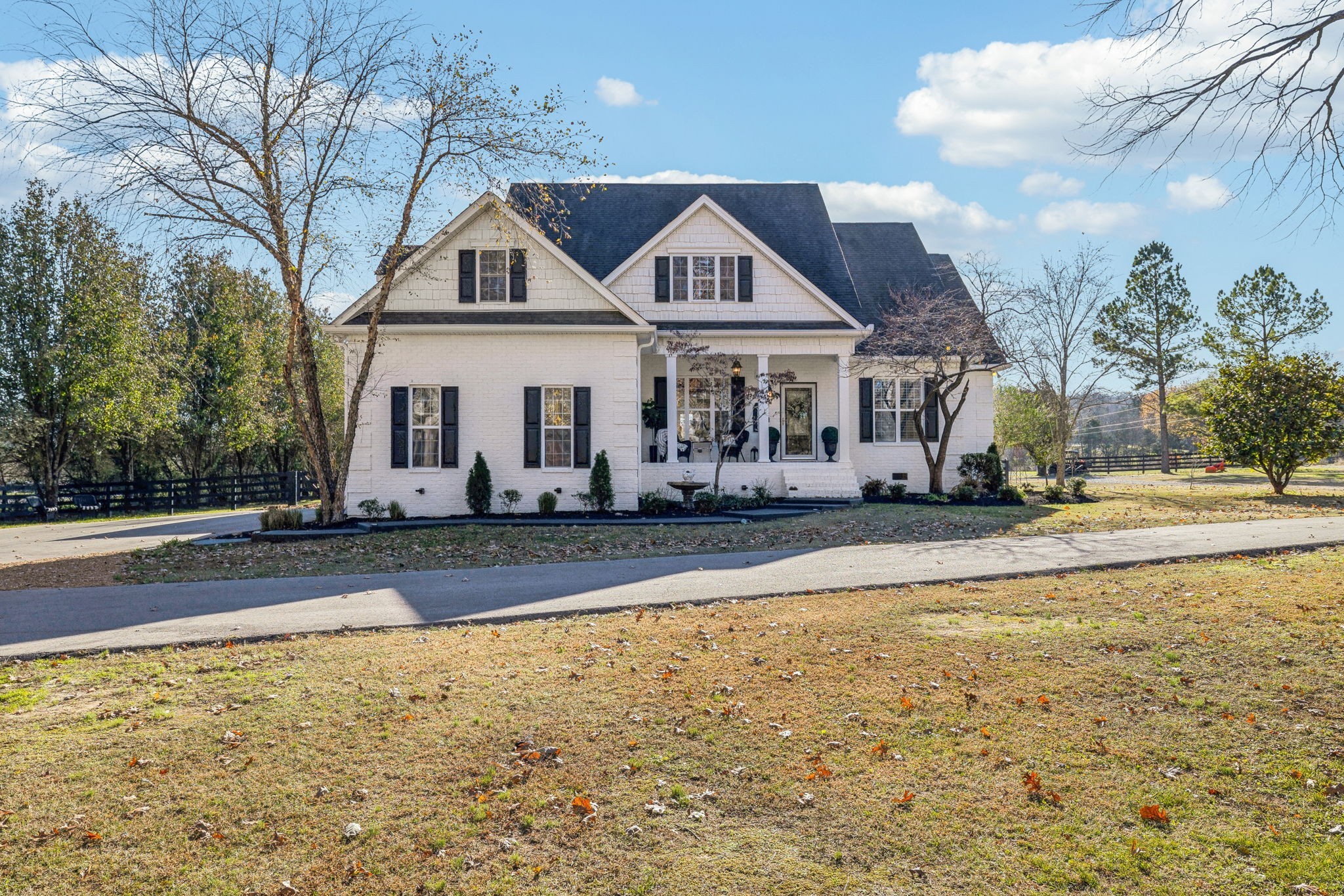576 Rocky Valley Road Lebanon, TN 37090 - Photo 2 of 62 a front view of a house with swimming pool