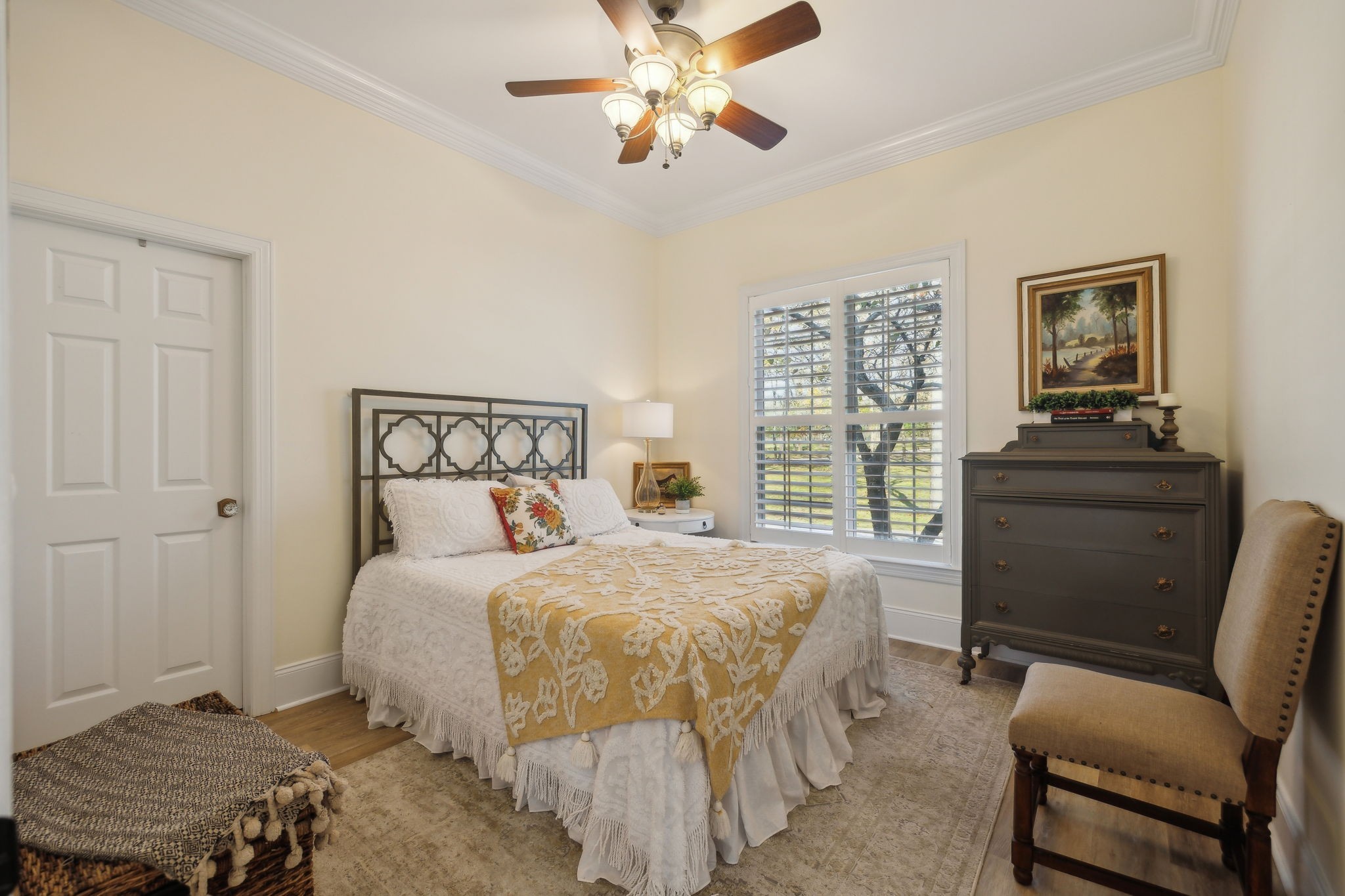 576 Rocky Valley Road Lebanon, TN 37090 - Photo 26 of 62 a bedroom with a bed and a chandelier