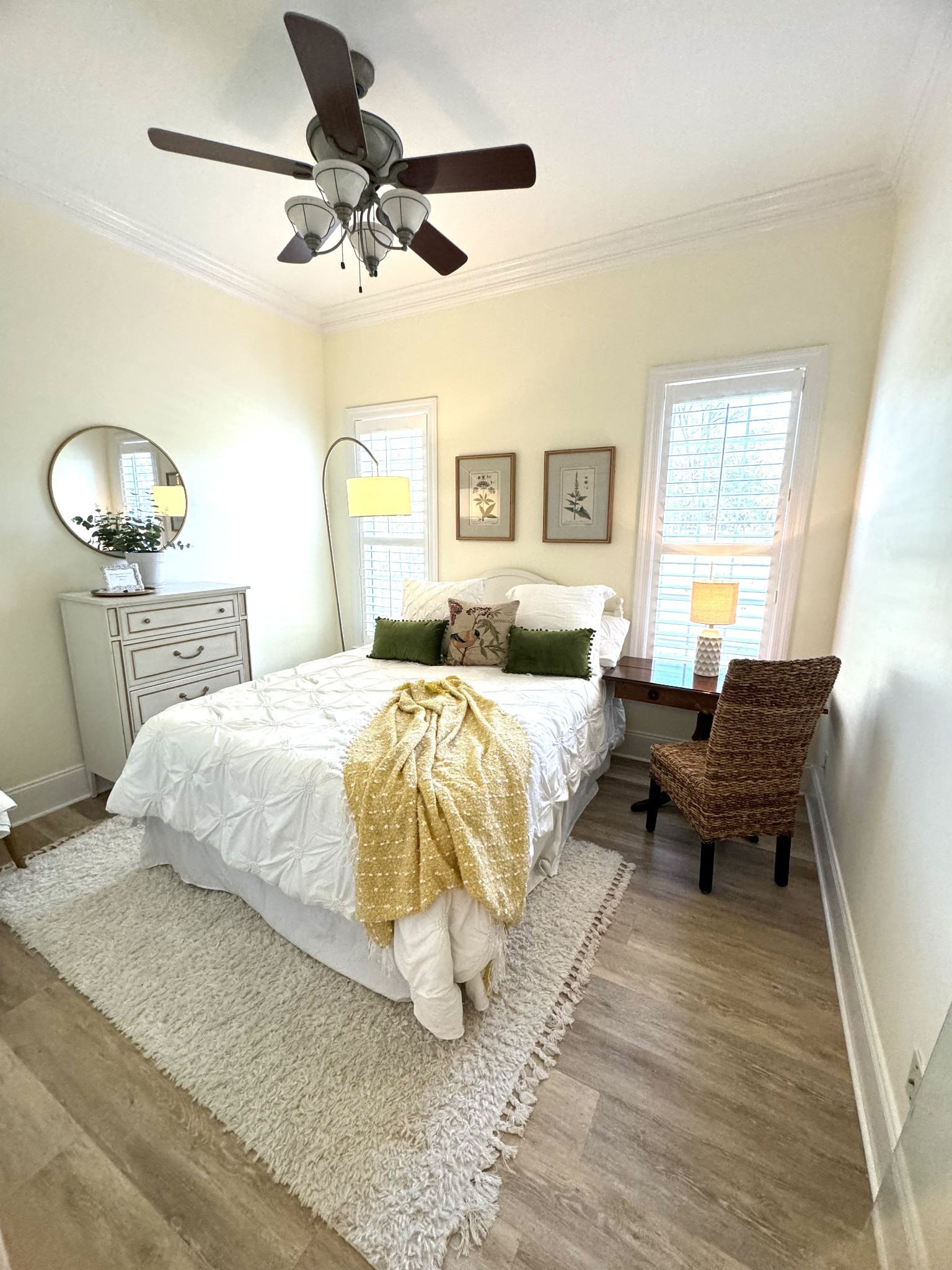 576 Rocky Valley Road Lebanon, TN 37090 - Photo 28 of 62 a bedroom with a bed and wooden floor