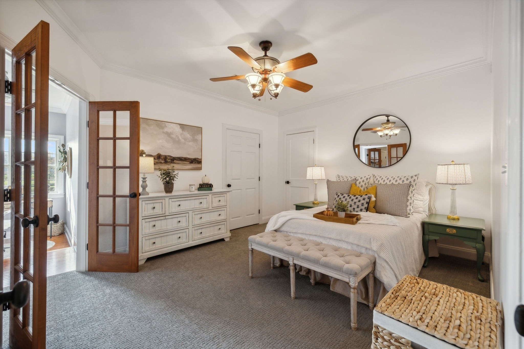 576 Rocky Valley Road Lebanon, TN 37090 - Photo 34 of 62 a bedroom with a bed and a chandelier