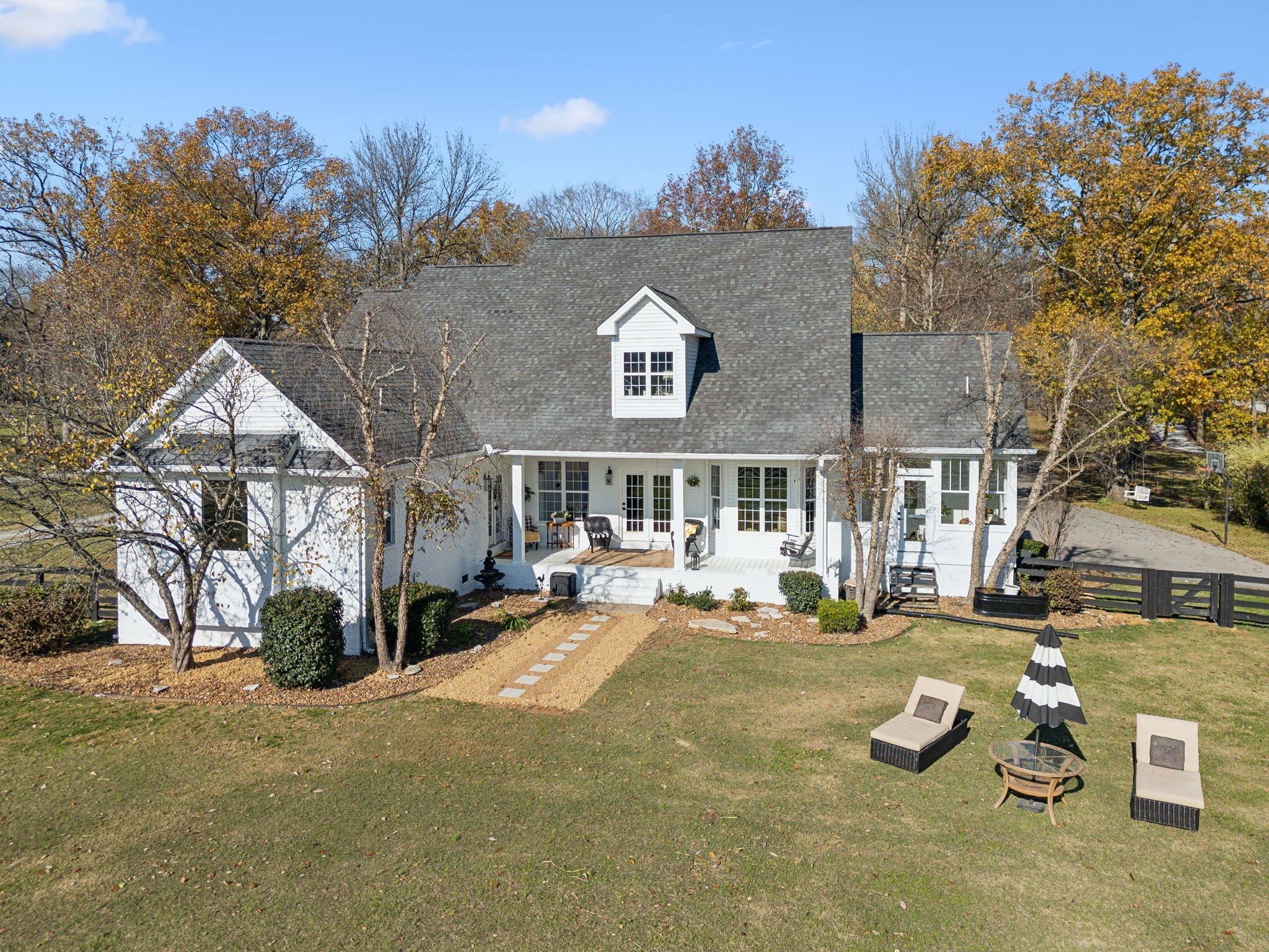 576 Rocky Valley Road Lebanon, TN 37090 - Photo 41 of 62 a view of a house with backyard patio and sitting area